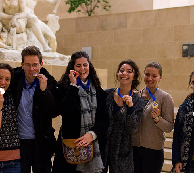 team building louvre museum winning team