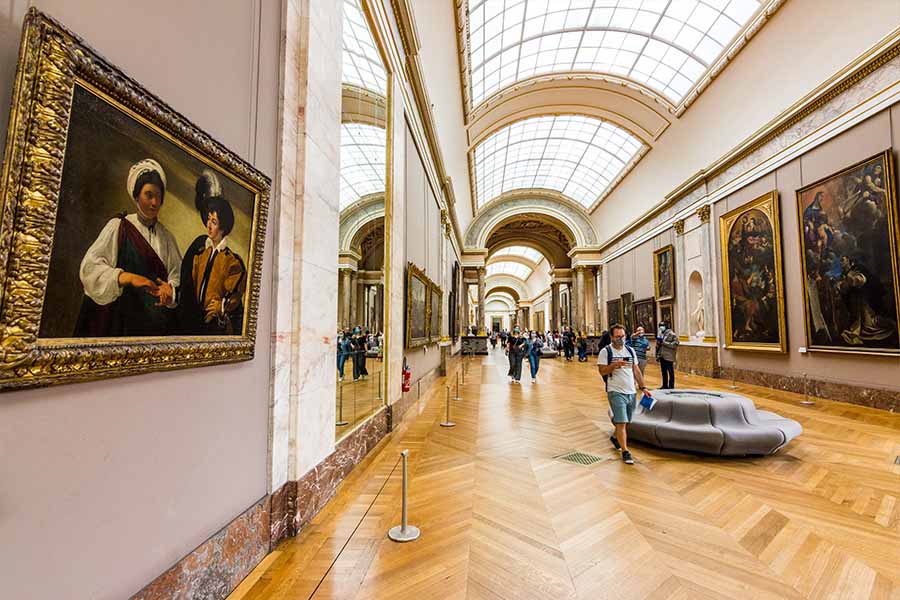 grande galerie in the Louvre and the Fortune Teller painting by Caravaggio